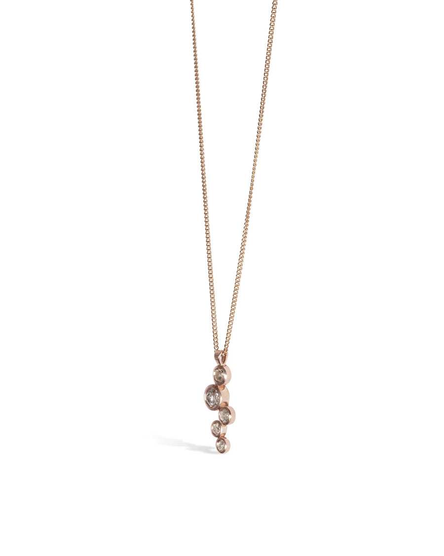 Rose gold pendant necklace with organic bubble design set with five diamonds on a fine chain