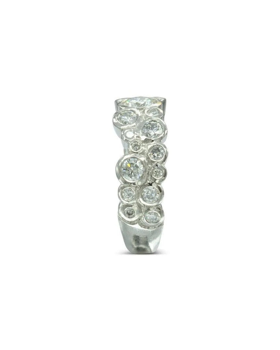 Silver eternity ring with contemporary bubble-set diamonds.