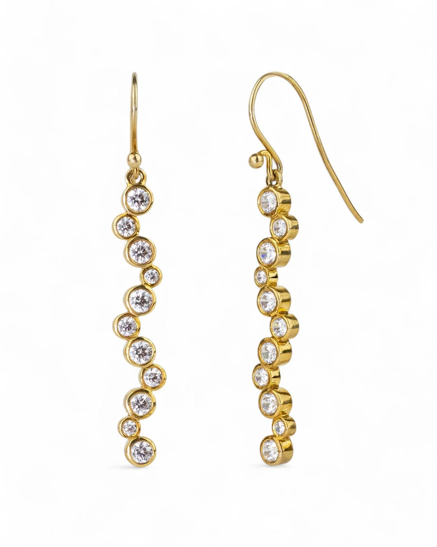9ct yellow gold long drop earrings with natural diamonds in a wavy bubble design.