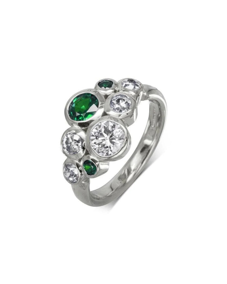 Silver ring with clustered diamonds and emeralds in organic bubble design