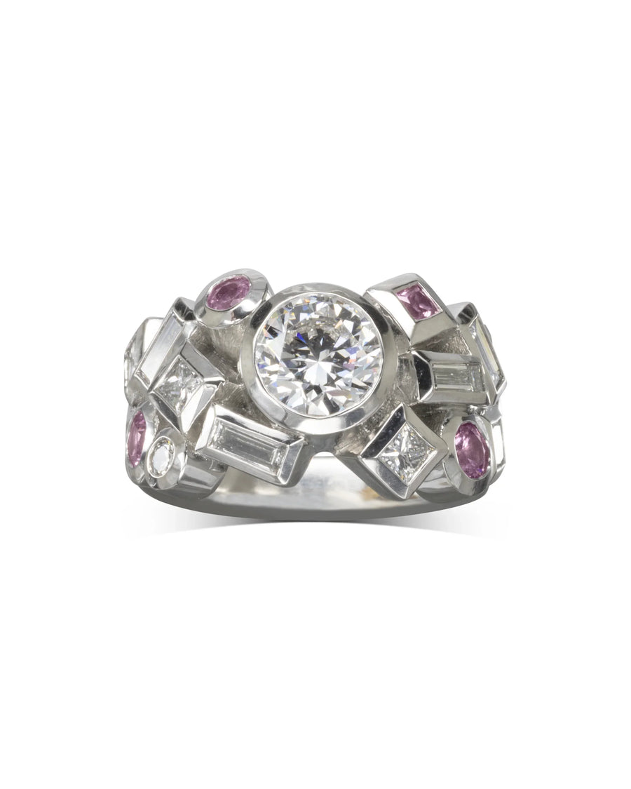 Handmade luxury silver ring with central diamond, pink sapphires, and geometric settings