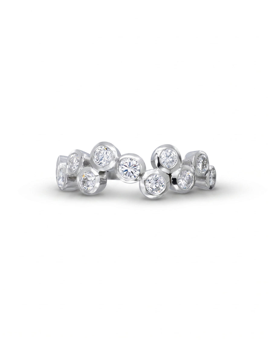 White gold half eternity ring with bezel-set round diamonds in a bubble design.