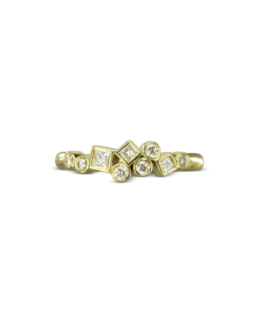 18ct yellow gold ring with round and square diamonds in a scattered design.