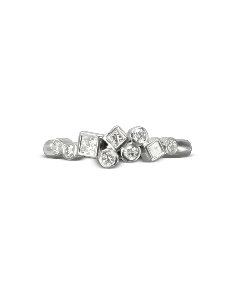9ct white gold ring with scattered round and square diamonds.