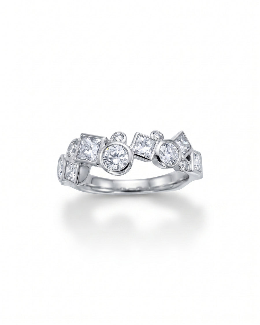 White gold ring with round and square cut diamonds.