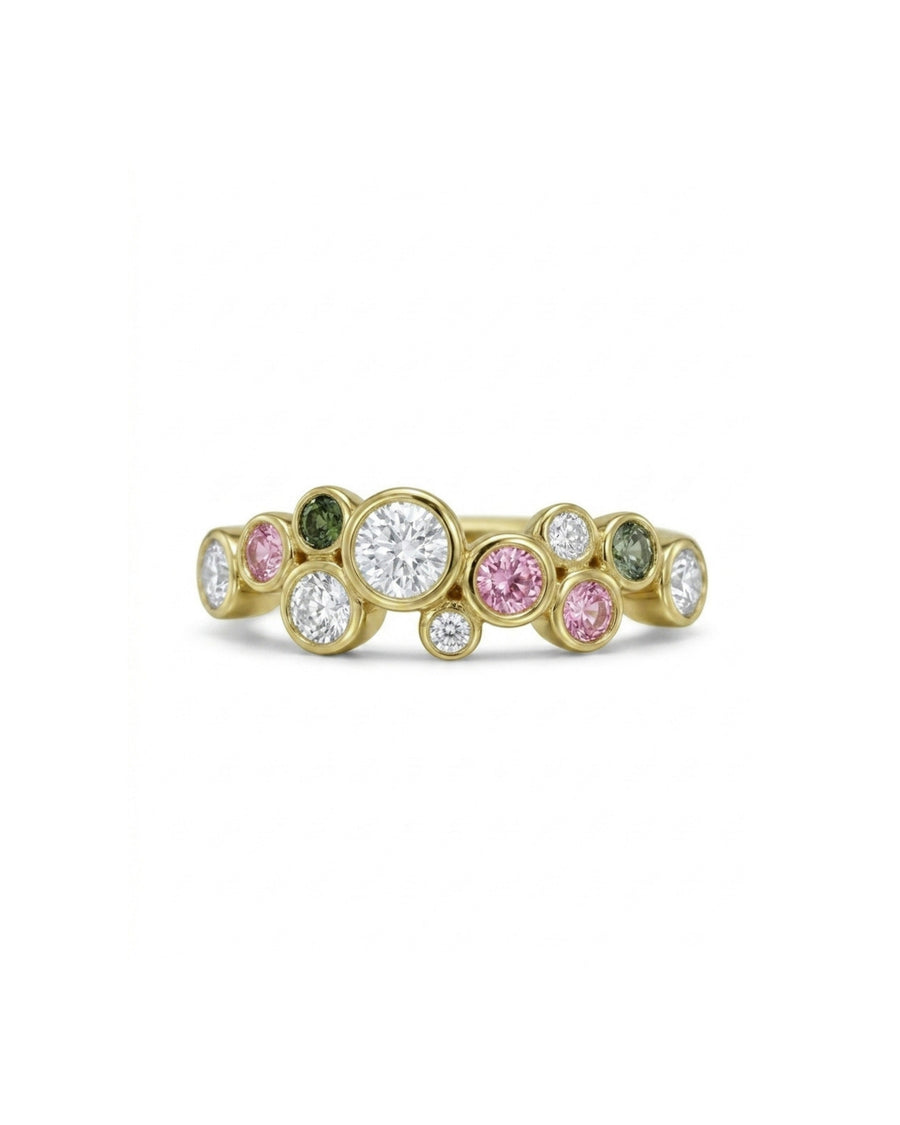 Gold half eternity ring with sapphire, diamond, and tsavorite gemstones in a bubble design.