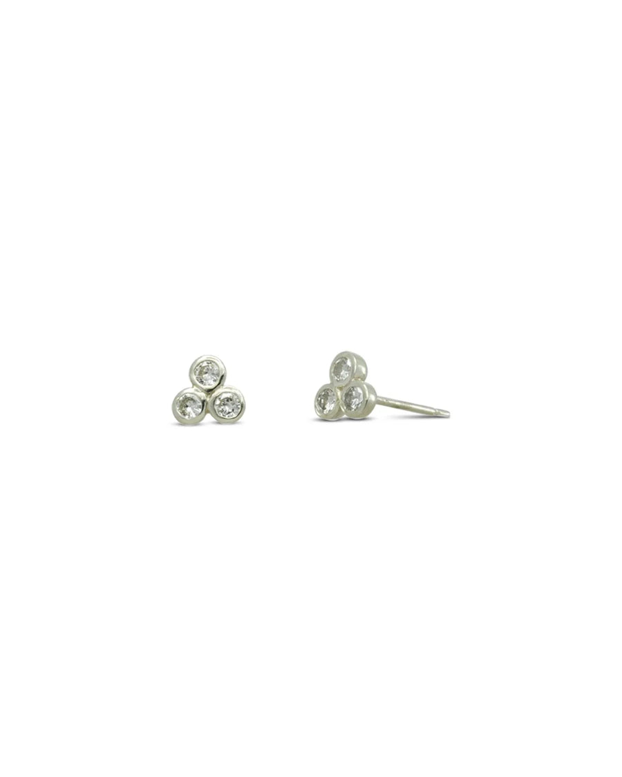 Gold trefoil stud earrings with three round diamonds.