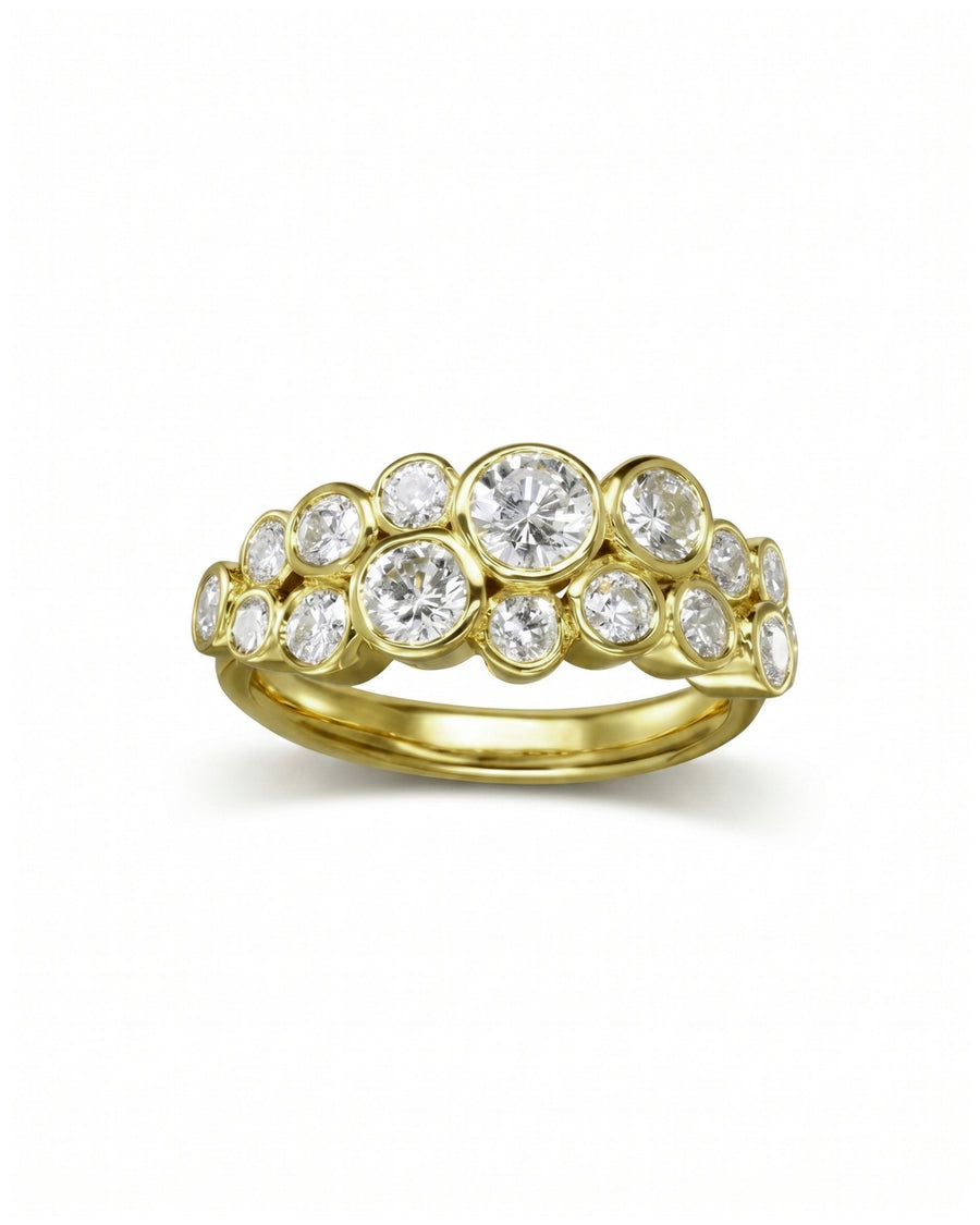 Gold two-row ring with bezel-set round diamonds in a bubble design.
