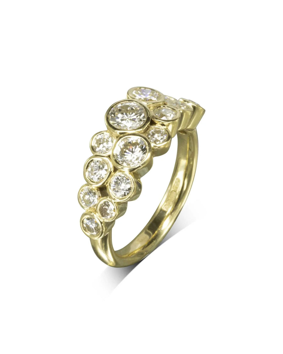 Yellow gold ring with two rows of bezel-set round diamonds in a bubble design.