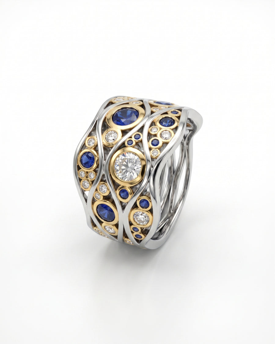 Gold and silver Bubbles Wave ring with large diamonds and blue sapphires.