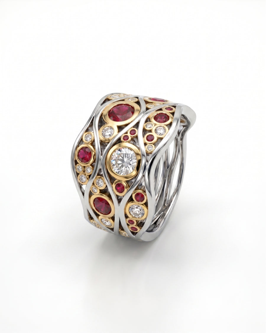 White gold ring with rubies and diamonds in a large, wave-like design.