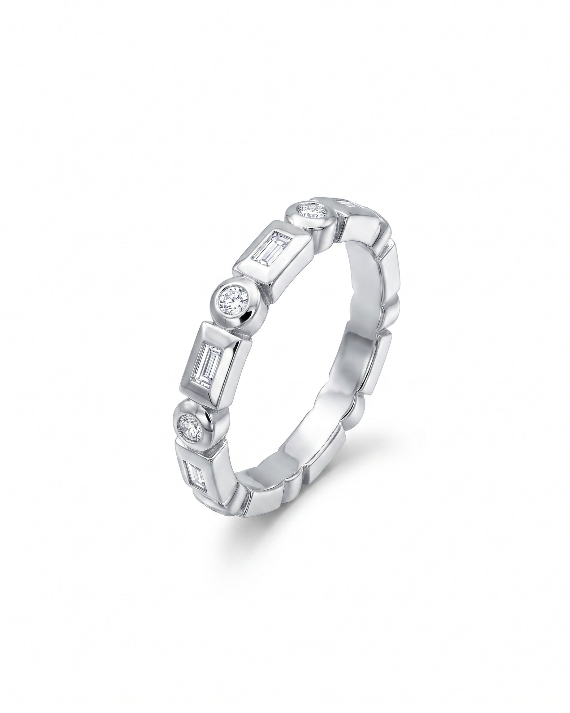 White gold full eternity ring with alternating baguette and round brilliant cut diamonds.