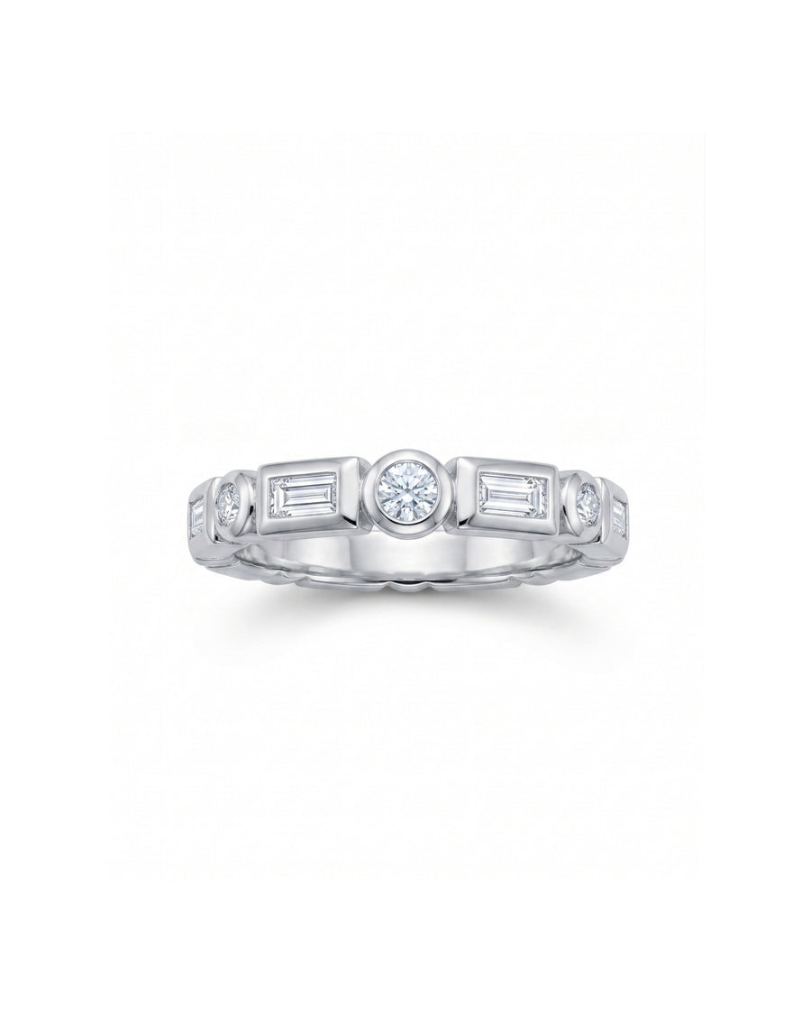 White gold full eternity ring with alternating round brilliant and baguette cut diamonds.