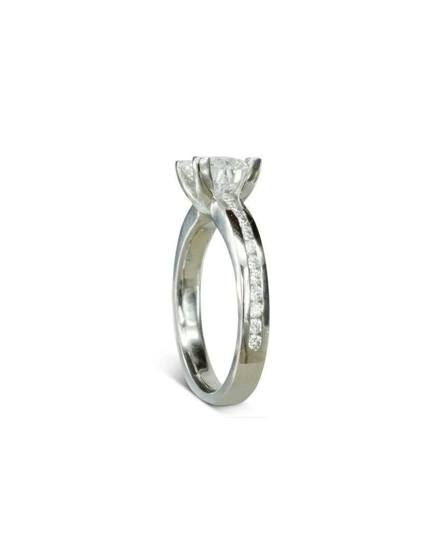 Silver channel set diamond engagement and wedding ring.
