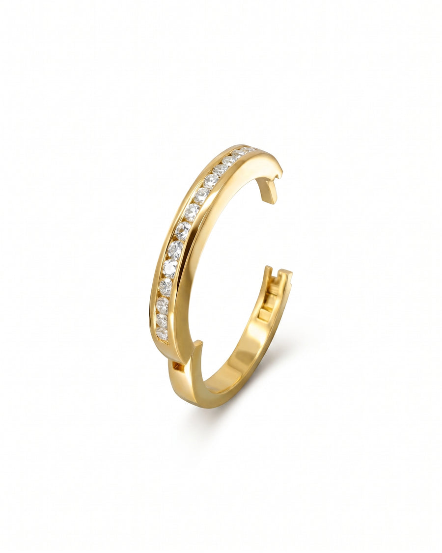 Yellow gold channel set diamond hinged ring.