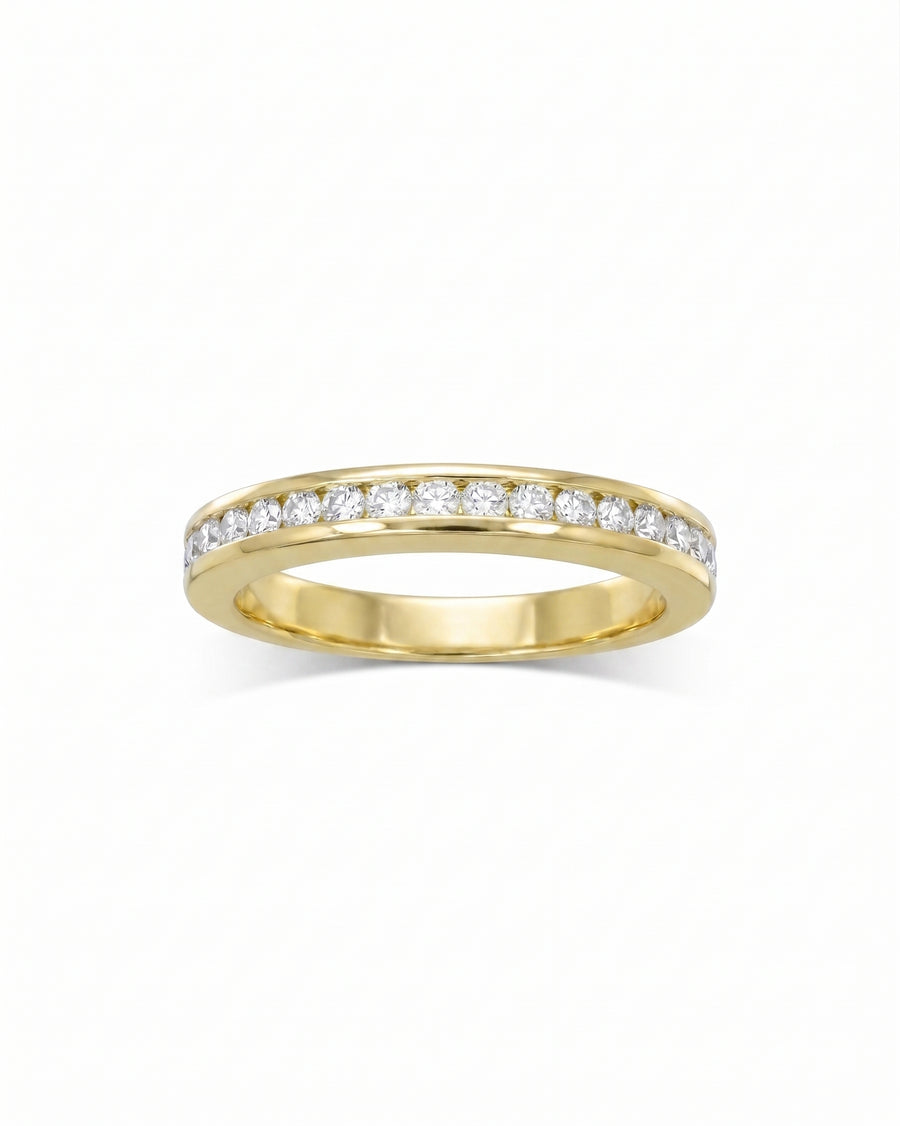 Yellow gold channel set diamond hinged ring.