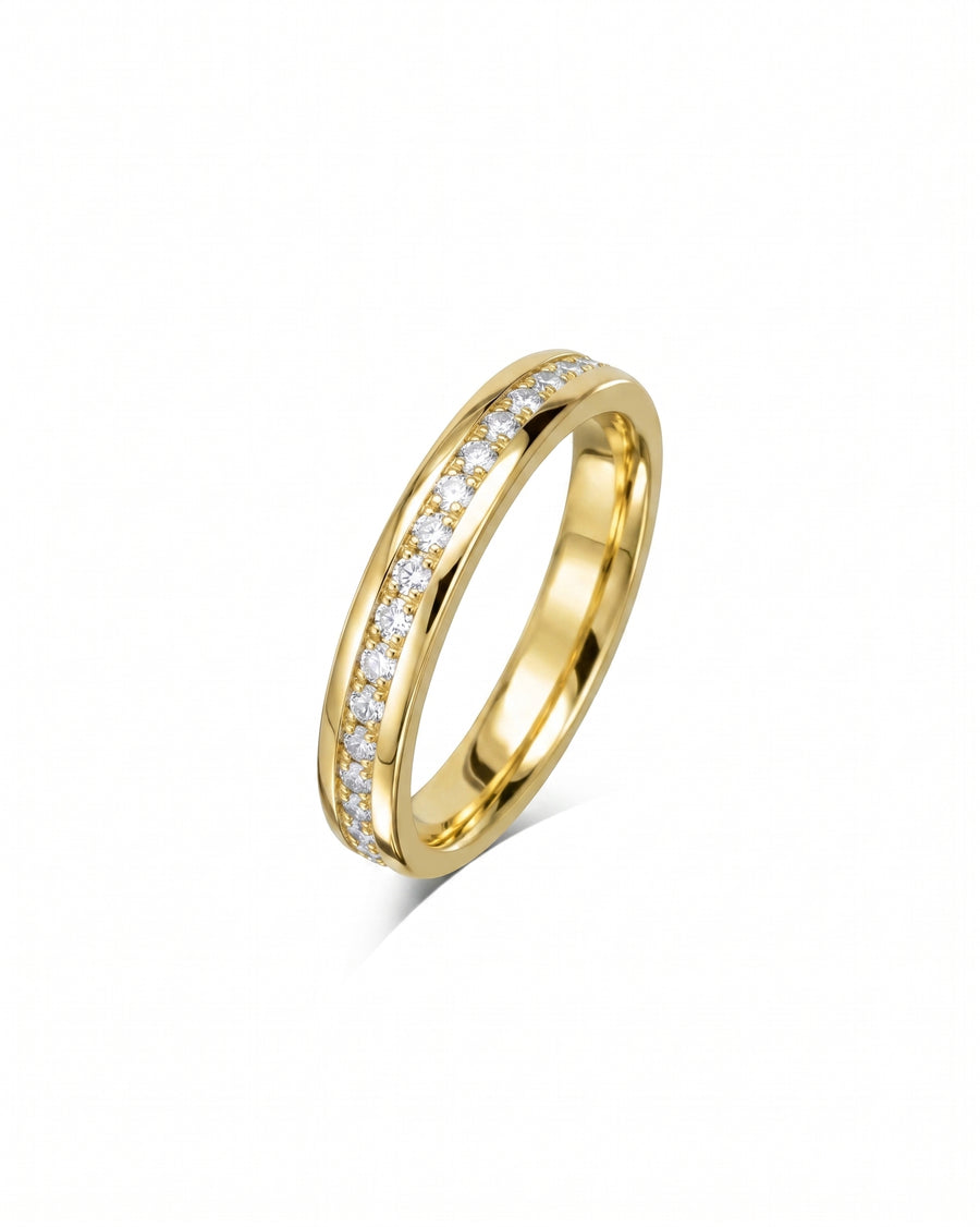 Yellow gold channel set diamond ring.