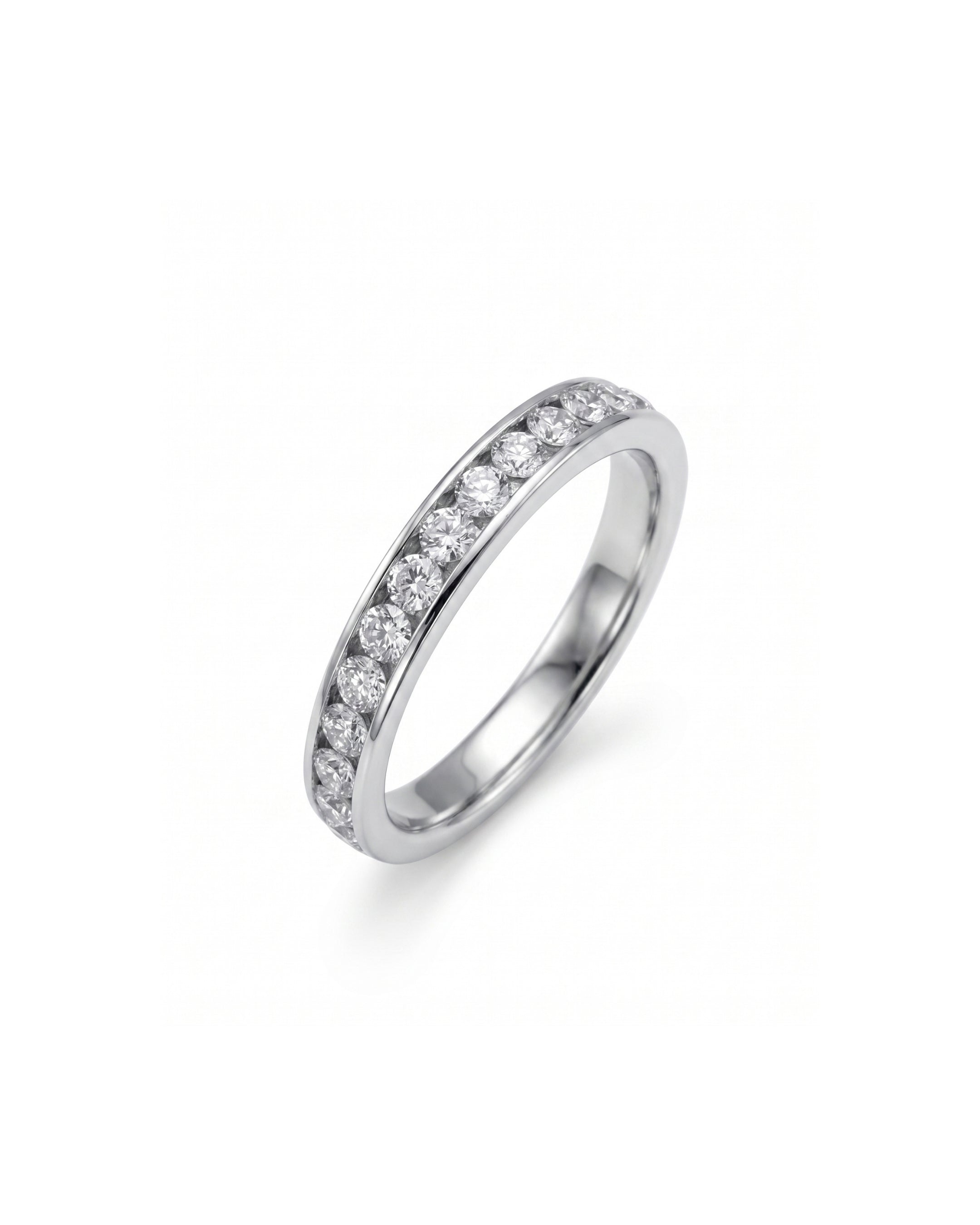 White gold channel set ring with round brilliant diamonds.