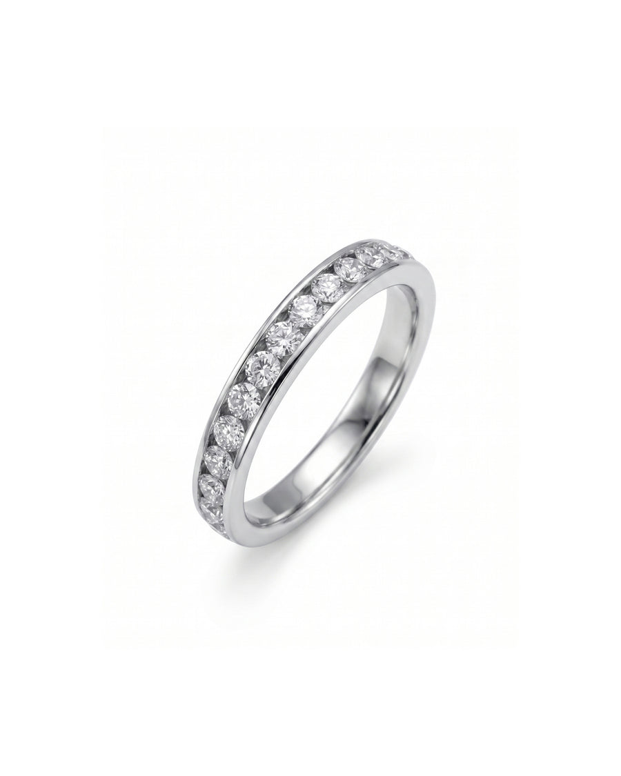 White gold channel set ring with round brilliant diamonds.