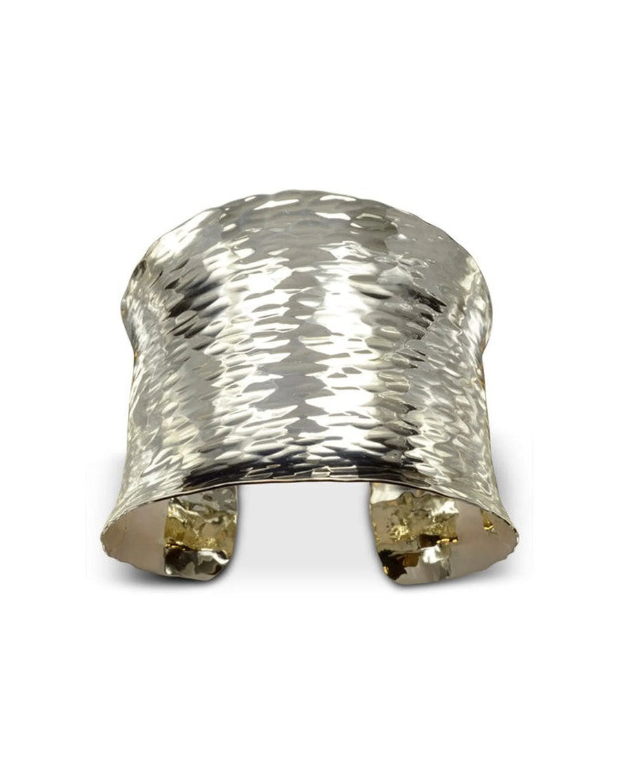 Handmade wide concave silver cuff bracelet with hammered texture and reflective finish
