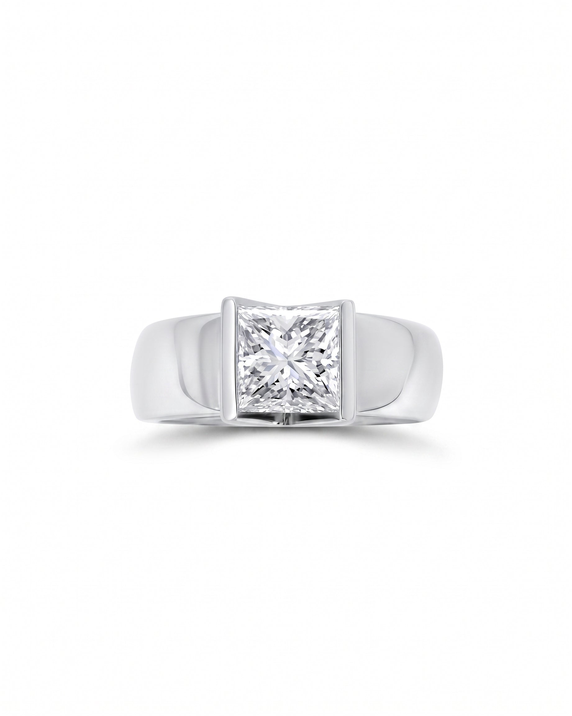 White gold engagement ring with a princess cut diamond in a chunky V set.