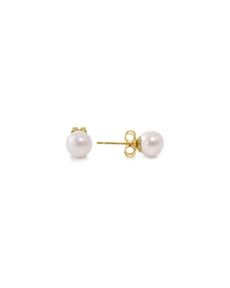 Gold stud earrings with classic round white pearls.