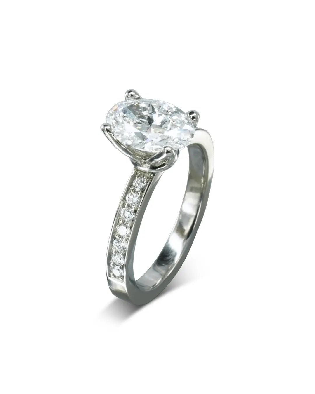 Claw Oval Diamond Engagement Ring and Pavé Set Diamond Band Ring Pruden and Smith