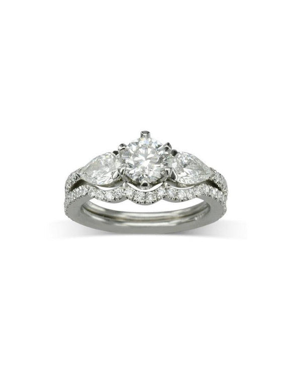 Claw Round and Pear Shaped Diamond Trilogy Ring Ring Pruden and Smith Engagement Ring with one fitted band