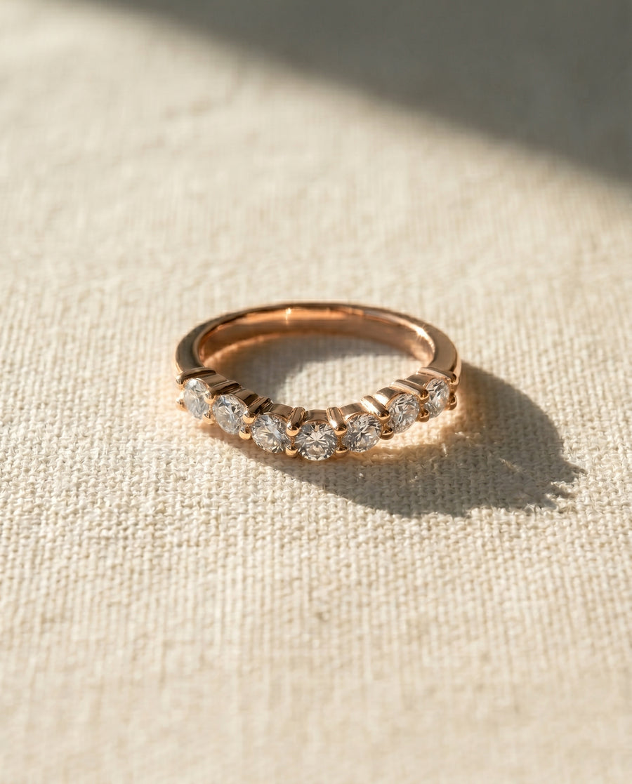 9ct rose gold wedding ring with seven round cut lab grown diamonds.