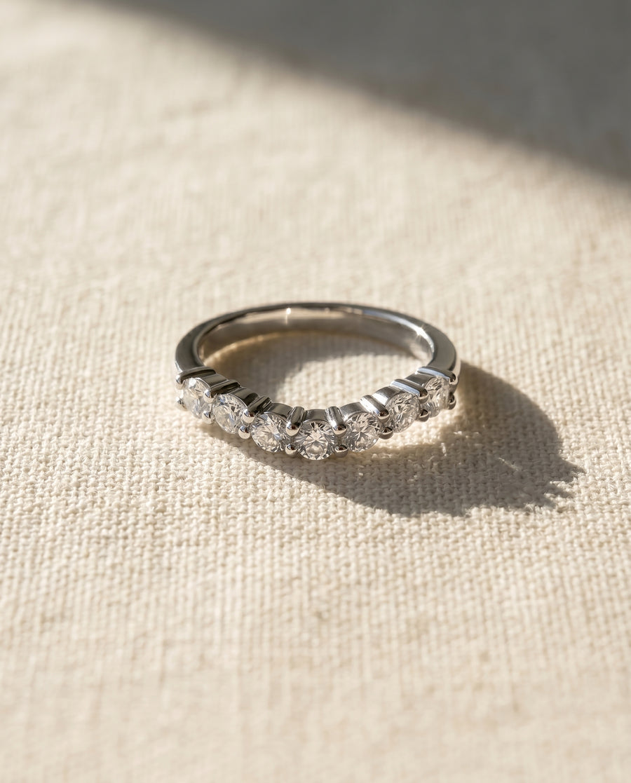 9ct white gold wedding ring with seven round cut lab grown diamonds.