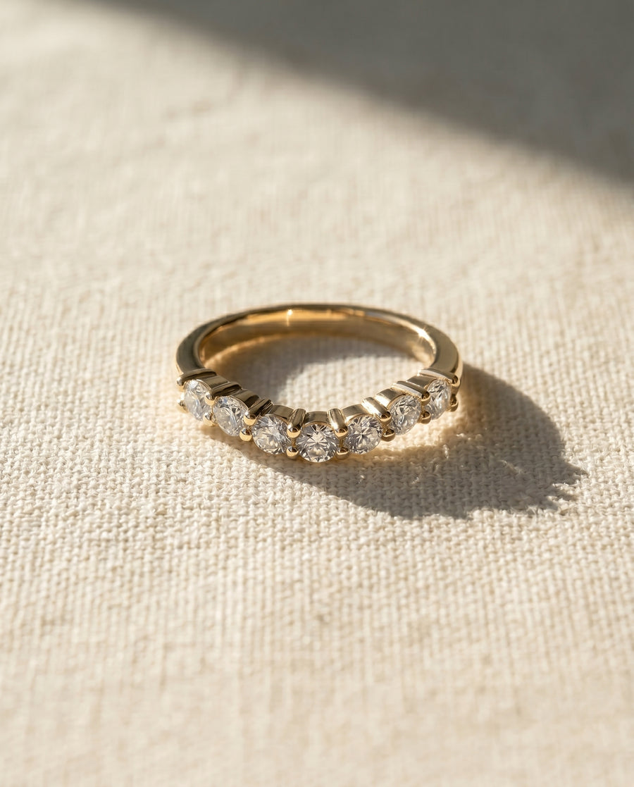 9ct yellow gold wedding ring with seven round cut lab grown diamonds.