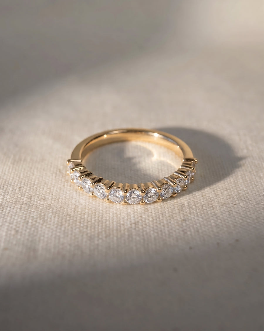 9ct yellow gold half eternity ring with claw set lab-grown diamonds.