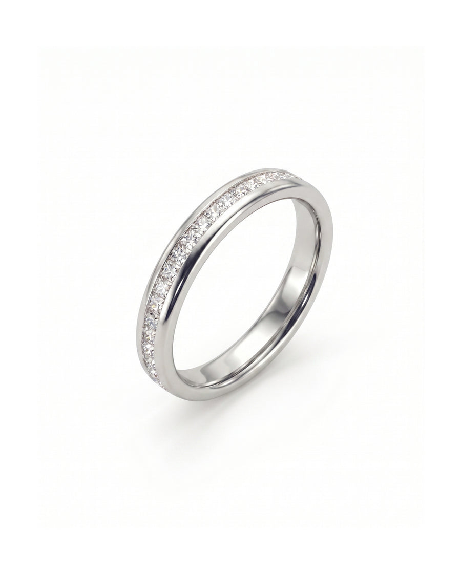 Silver band ring with channel-set princess cut diamonds.