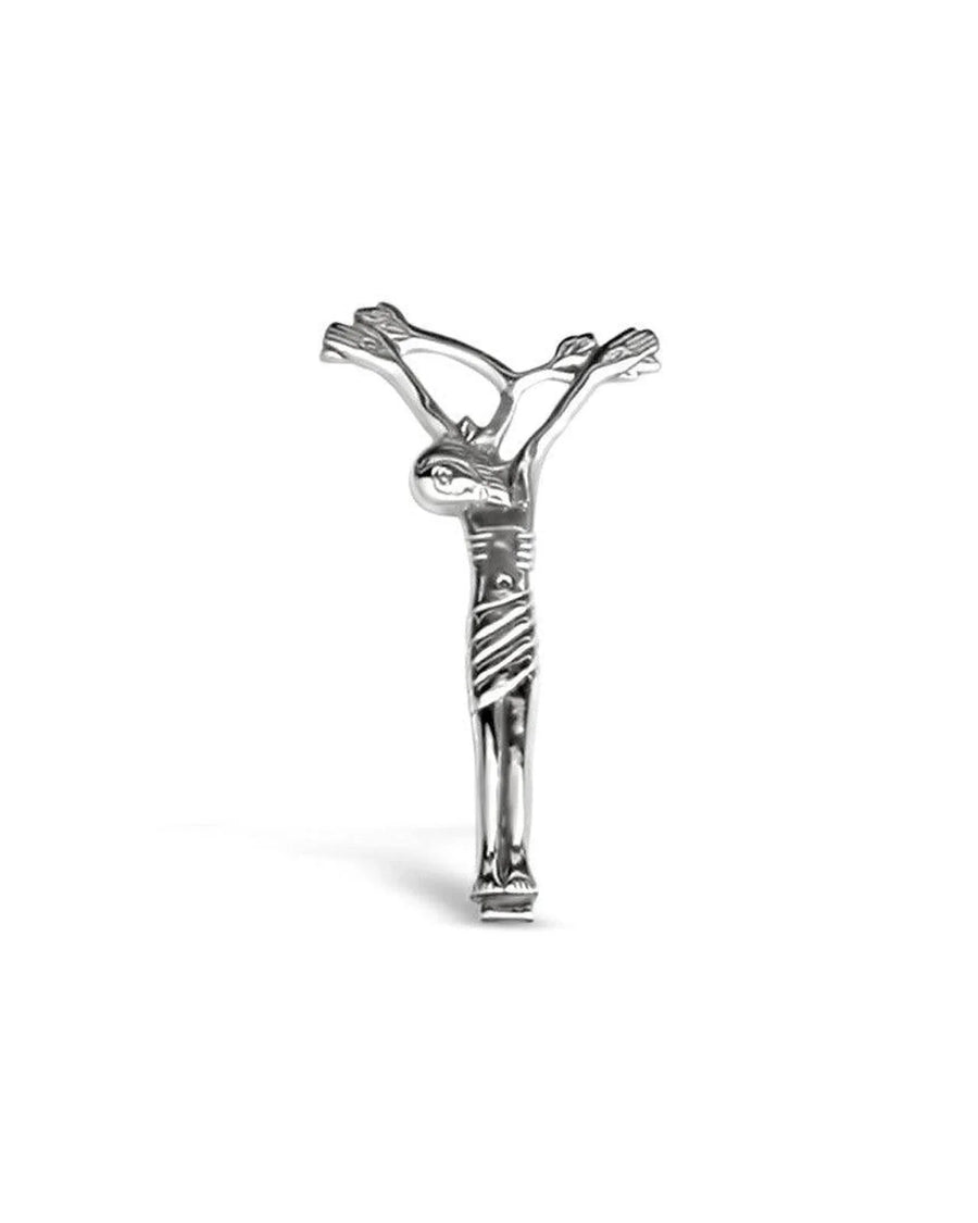 Handcrafted silver Christ figure on stylized tree, unique artisan jewellery piece