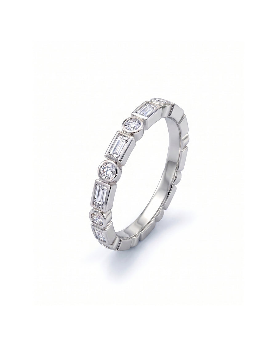 White gold ring with alternating baguette and round diamonds.
