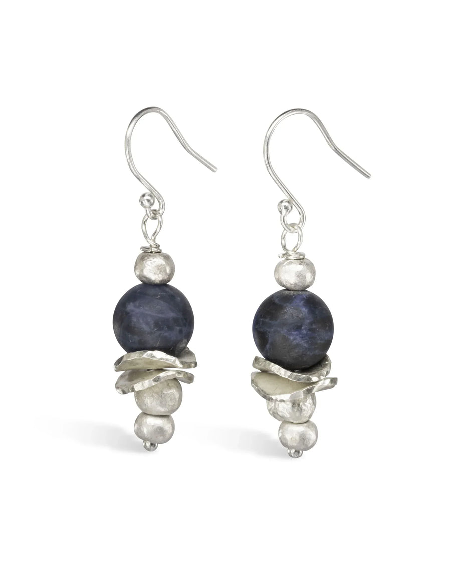 Handmade silver earrings with deep blue sodalite stones and organic textured accents