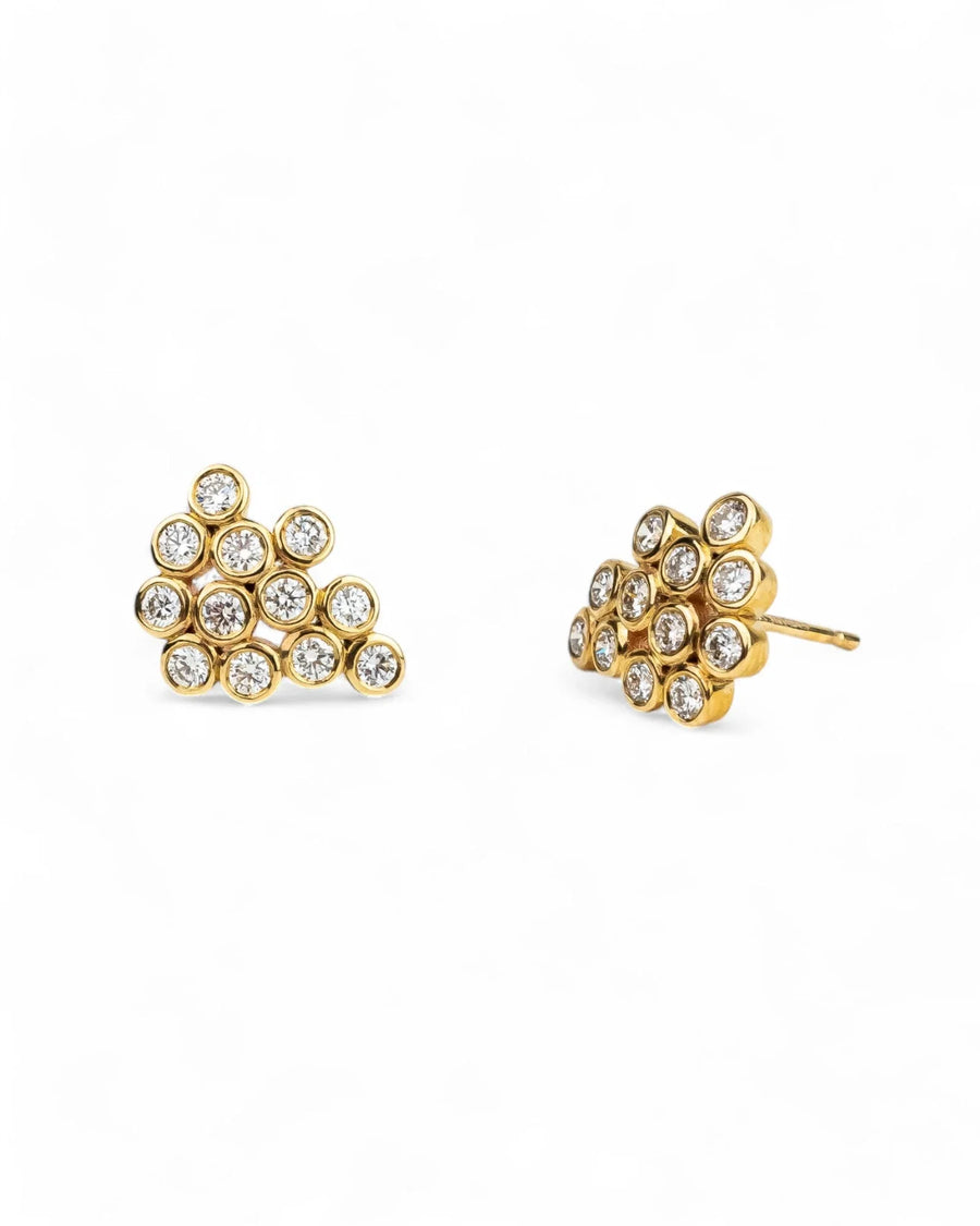 Yellow gold cluster stud earrings with round diamonds in bubble design on white background