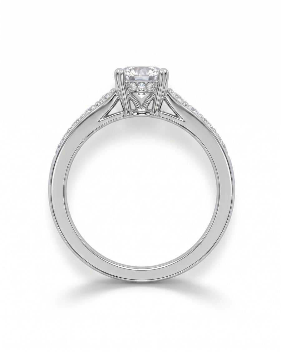 Silver diamond pave set engagement ring with a round center stone.