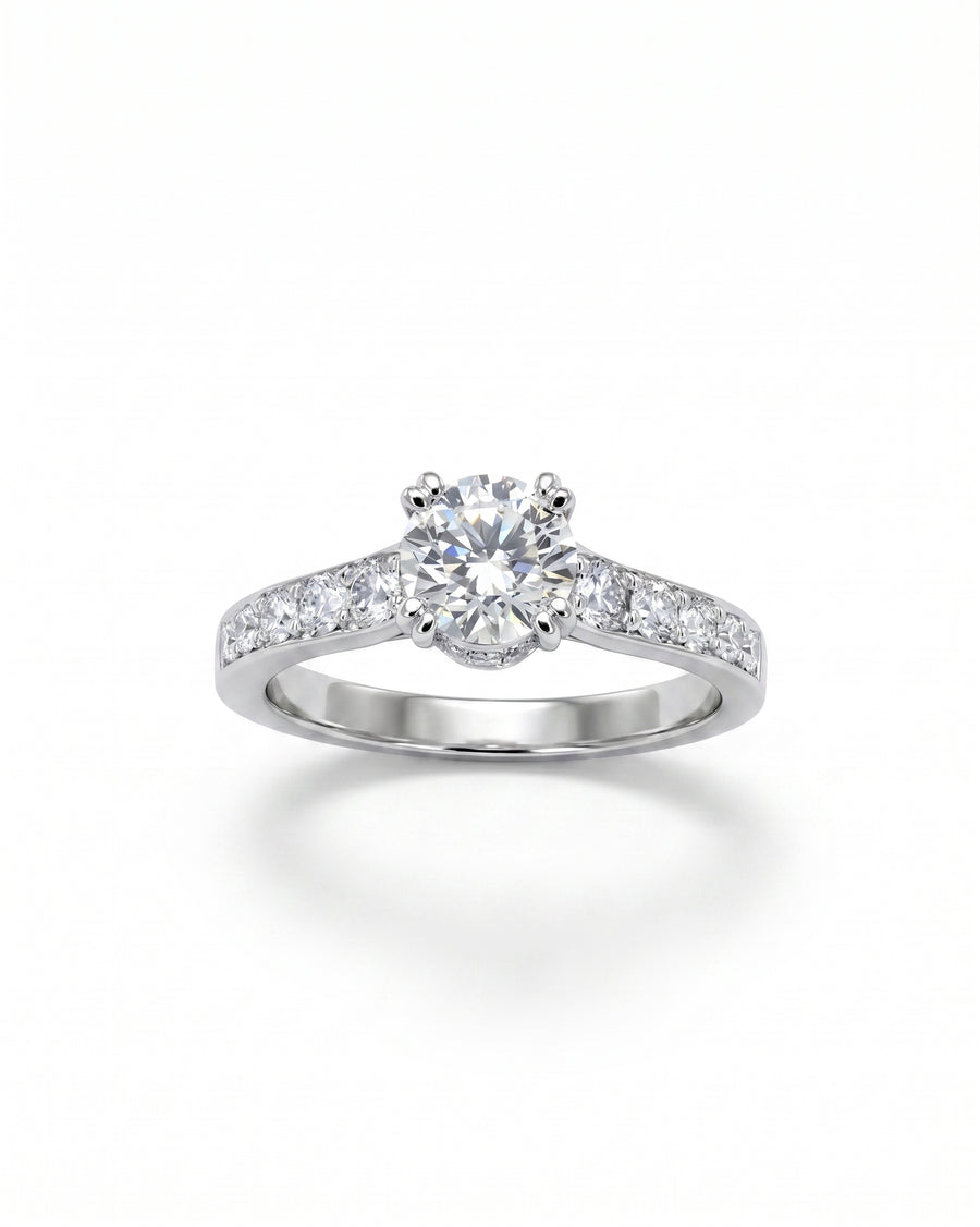 Silver diamond pave set engagement ring with a large center stone.