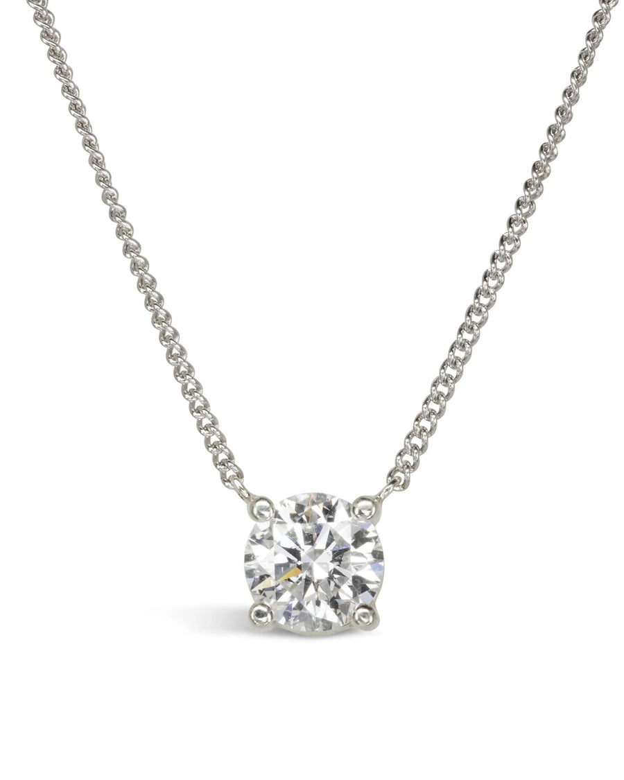 White gold solitaire diamond pendant necklace on fine chain, minimalist luxury jewellery