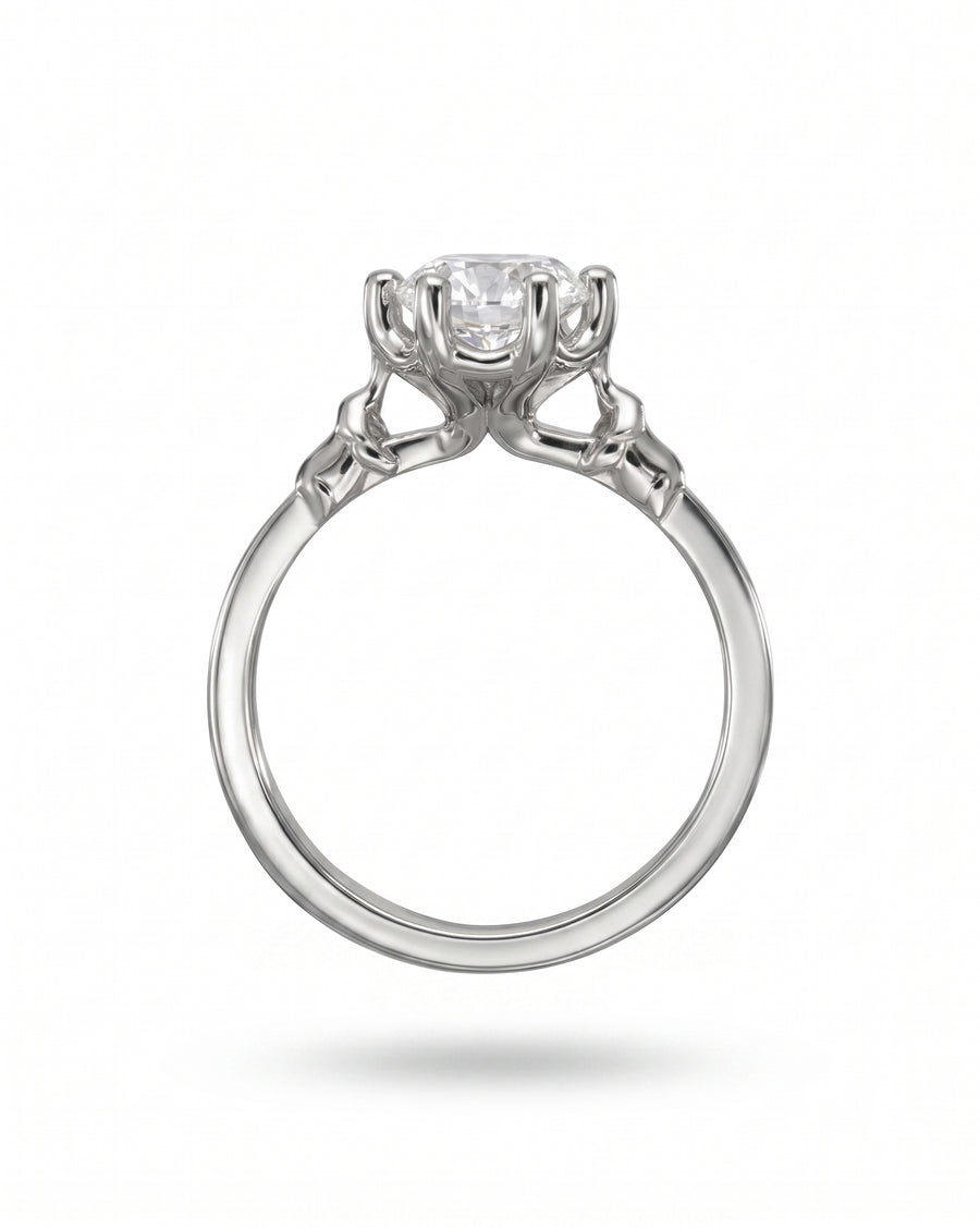 Silver elephant motif diamond engagement ring.