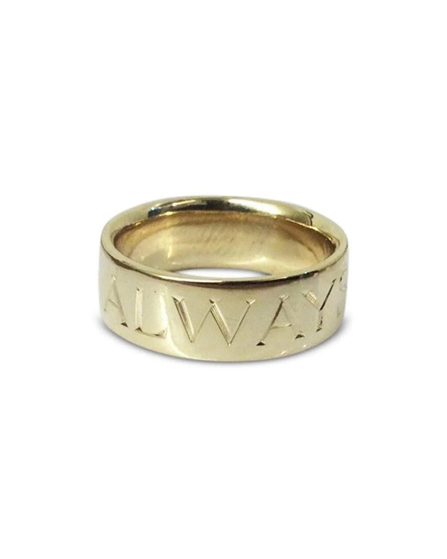 Gold wedding ring with engraved 'ALWAYS' inscription on a white background