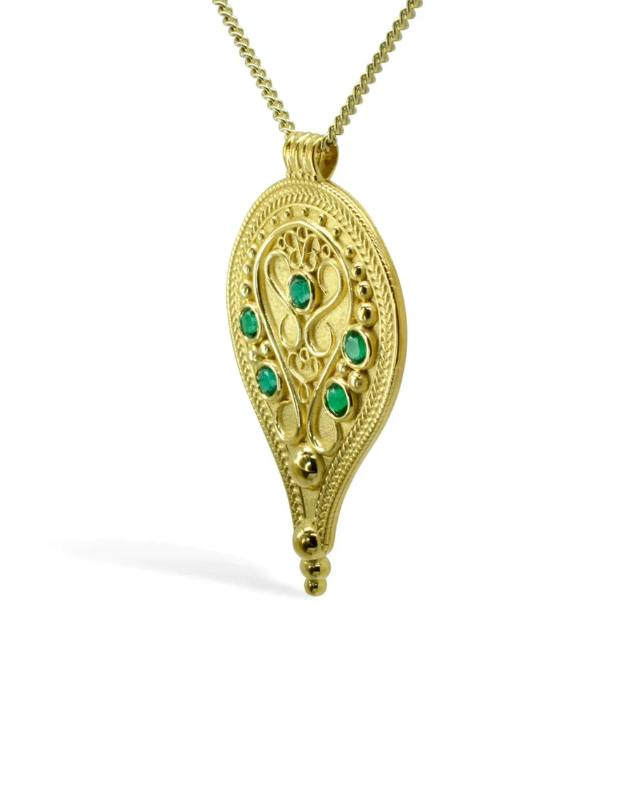 Filigree yellow gold pendant with pear shape and green emerald gemstones on chain