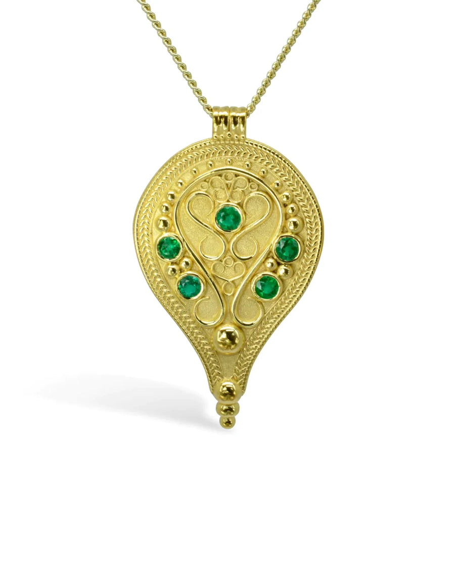 Filigree pear-shaped yellow gold pendant with green emerald gemstones