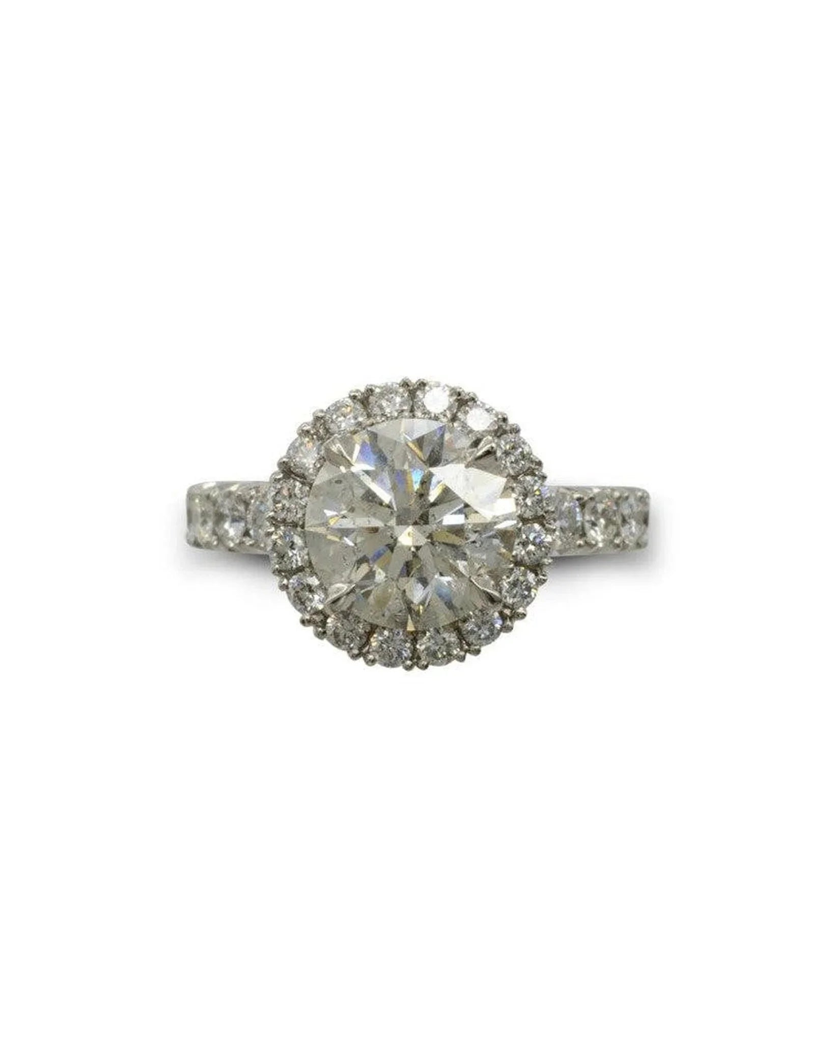 Platinum cluster ring with round brilliant-cut diamond halo and pavé band