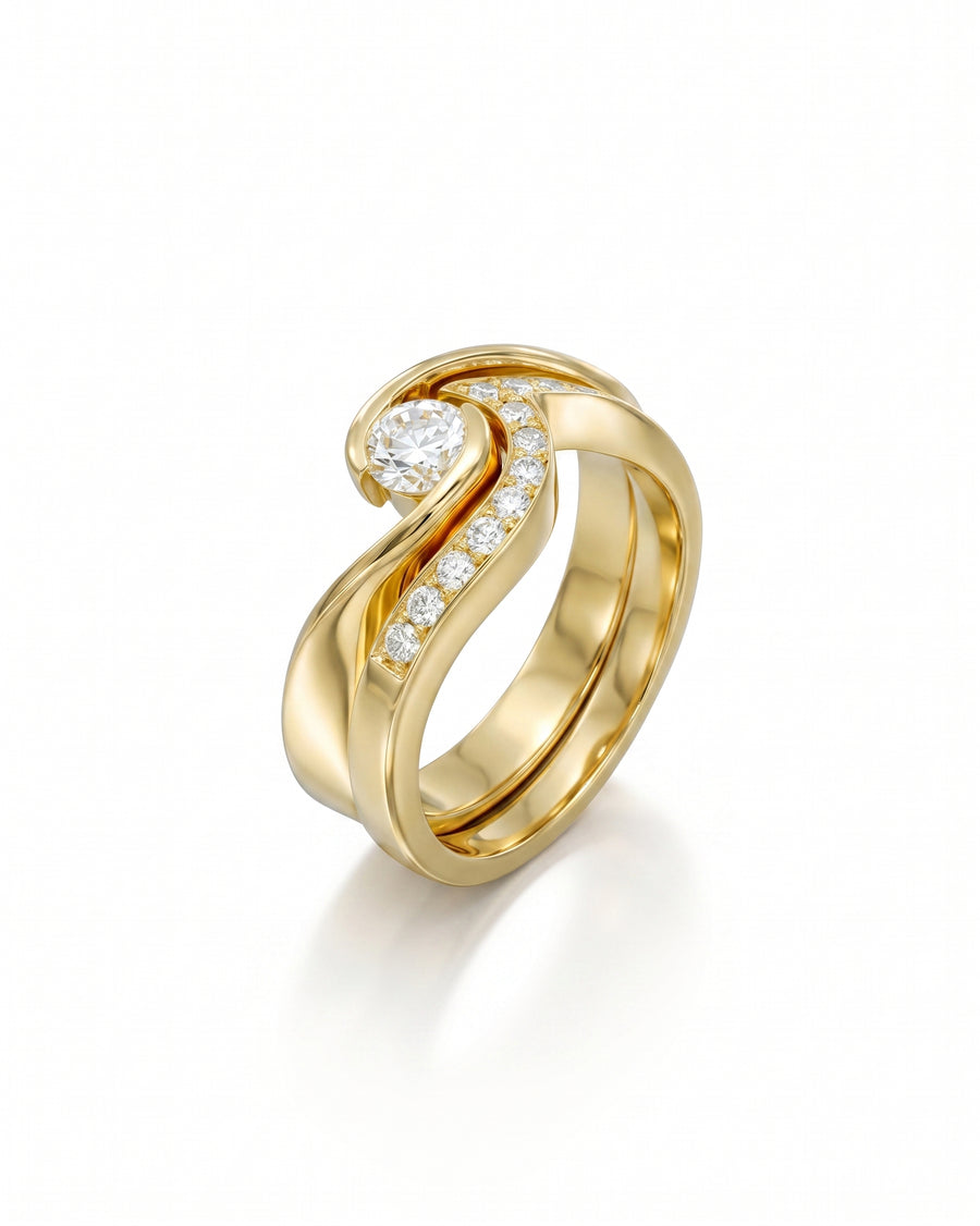 Yellow gold flat twist engagement and wedding band set with diamonds.