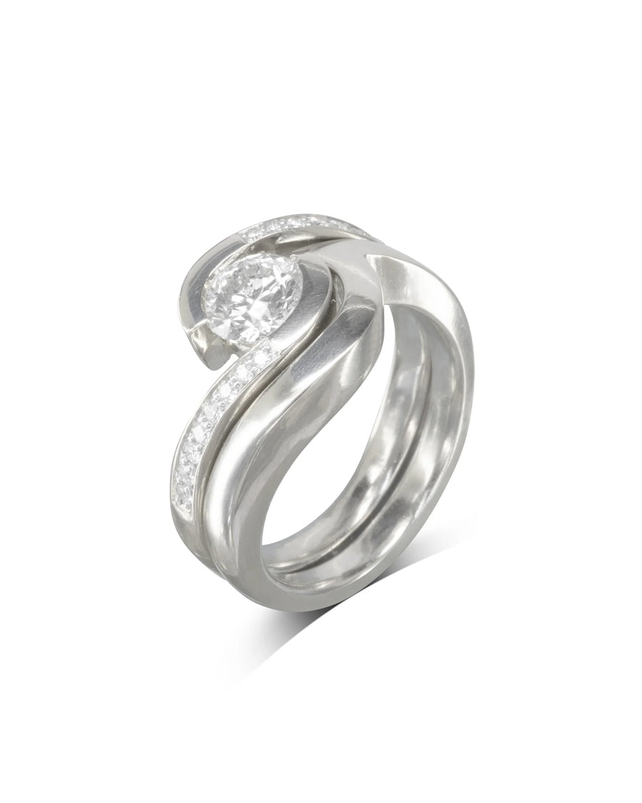 Yellow gold flat twist engagement and wedding band set with diamonds.
