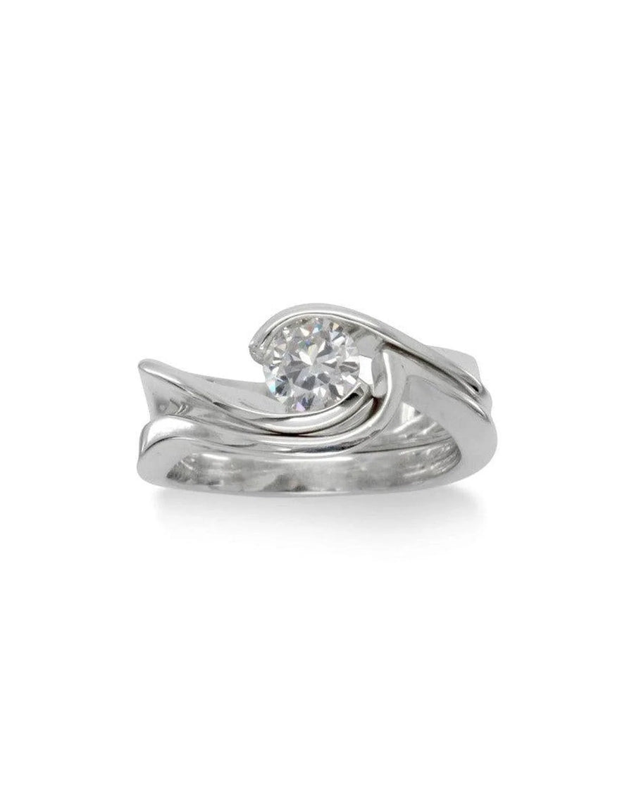 White gold flat twist engagement and wedding band set with a round diamond.