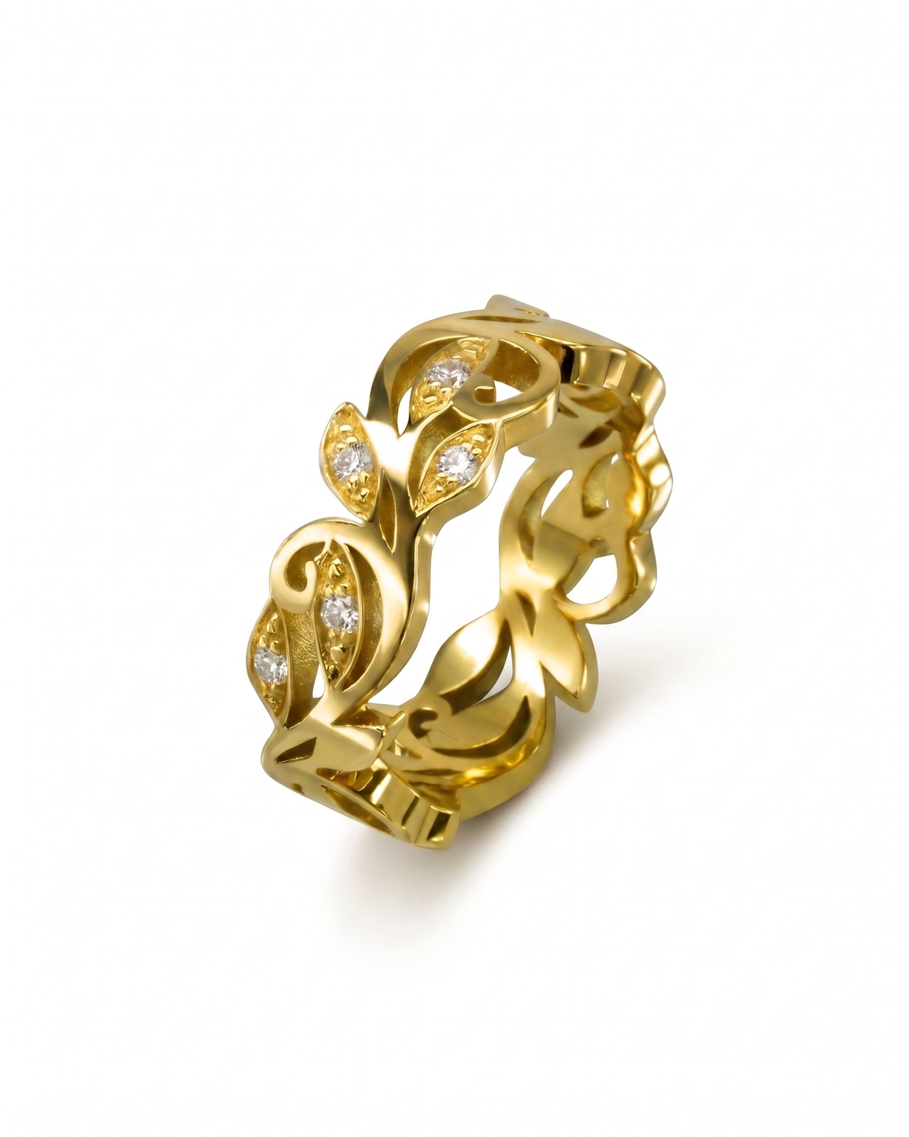 Gold floral diamond ring with leaf design.