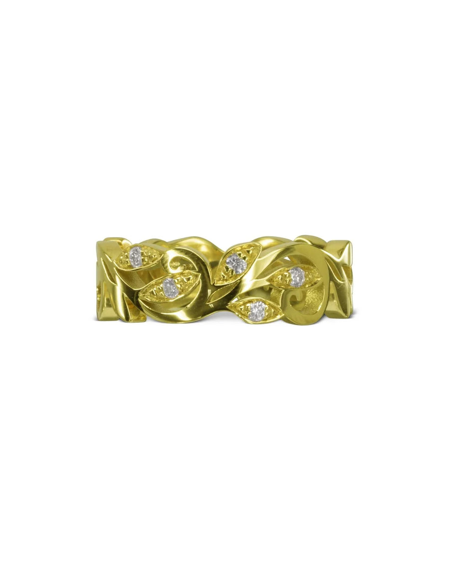 Gold floral diamond ring with leaf design.